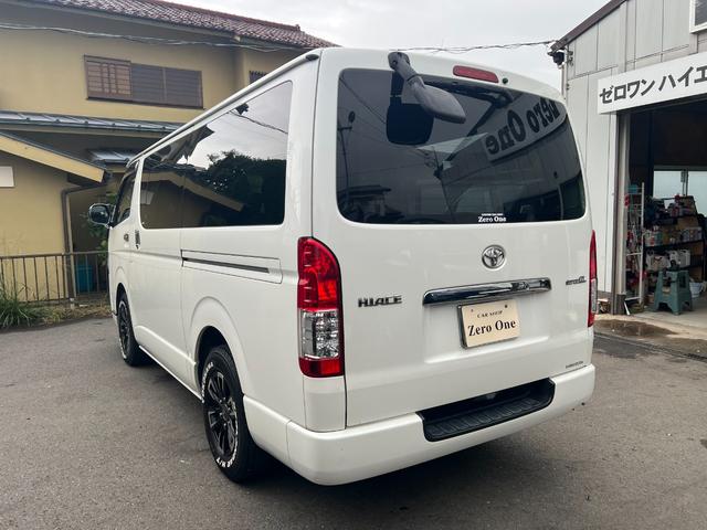 ハイエースバン ロングスーパーGL ディーゼル 15インチアルミ リア小窓付きガラス 純正SDナビ フルセグ SDオーディオ Bオーディオ オートエアコン Wエアバック 100V電源 ステアリングスイッチ リアシートベルト 記録簿(9枚目)