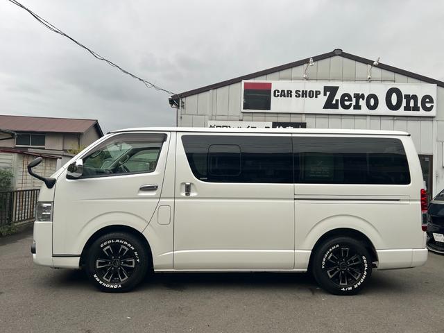 ハイエースバン ロングスーパーGL ディーゼル 15インチアルミ リア小窓付きガラス 純正SDナビ フルセグ SDオーディオ Bオーディオ オートエアコン Wエアバック 100V電源 ステアリングスイッチ リアシートベルト 記録簿(11枚目)