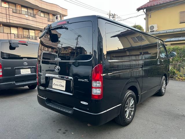 ハイエースバン ロングスーパーGL 3型スーパーGL 209ブラック 社外アルミ KenwoodSDナビ フルセグ ブルートゥースオーディオ 100V電源 ベットキット付き オートエアコン ダブルエアコン(7枚目)