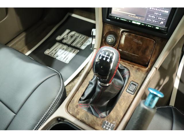 ローレル メダリストＧ　ＭＴ載せ替え／エンケイ新品１８ＡＷ／新品シートカバー／エアロ／車高調／社外マフラー／追加メーター／ナビ／ＥＴＣ／色替車（38枚目）