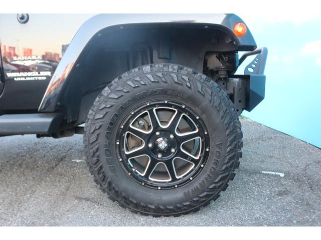 ジープ・ラングラーアンリミテッド サハラ　ワンオーナー／正規輸入車／リフトアップ／ＴＥＲＡＦＲＥＸフロントバンパー／ＸＴＲＥＭＥ－Ｊ１７インチアルミホイール／カロッツェリアナビ／フルセグＴＶ／クルーズコントロール／サイドステップ／ＥＴＣ／（18枚目）