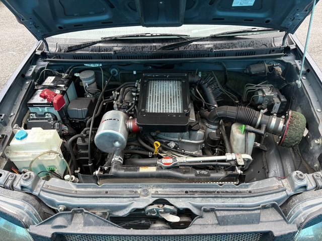 ジムニー ランドベンチャー 5速MT/リフトアップ/4WD/社外マフラー/社外エアクリ/9インチディスプレイオーディオ/シートヒーター/社外ステアリング/キーレス/電動格納ミラー/LEDヘッドライト/(16枚目)