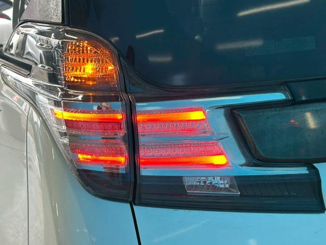 ヴェルファイア 2.5Z Aエディション ゴールデンアイズ 公認エアサス/OP:ツインムーンルーフ/オプションカラー/7人乗り/後席モニター/各純正パーツあり/禁煙車/両側パワースライド/社外エアロ/オットマン/純正ナビ/バックカメラ/100V電源/ETC(24枚目)