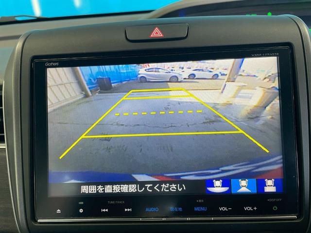 フリードハイブリッド ハイブリッド・ＥＸ　ＯＰ：１１インチ後席フリップダウンモニター／８インチ純正ナビ／ホンダセンシング／シートヒーター／レーダークルーズ／レーンキープアシスト／クリアランスソナー／ドライブレコーダー／ＬＥＤヘッド／ＥＴＣ／（10枚目）