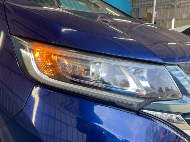 フリードハイブリッド ハイブリッド・ＥＸ　ＯＰ：１１インチ後席フリップダウンモニター／８インチ純正ナビ／ホンダセンシング／シートヒーター／レーダークルーズ／レーンキープアシスト／クリアランスソナー／ドライブレコーダー／ＬＥＤヘッド／ＥＴＣ／（24枚目）