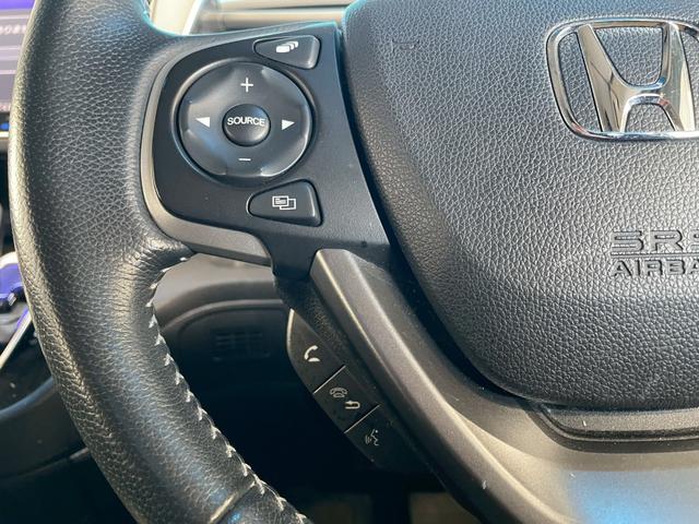 フリードハイブリッド ハイブリッド・ＥＸ　ＯＰ：１１インチ後席フリップダウンモニター／８インチ純正ナビ／ホンダセンシング／シートヒーター／レーダークルーズ／レーンキープアシスト／クリアランスソナー／ドライブレコーダー／ＬＥＤヘッド／ＥＴＣ／（29枚目）