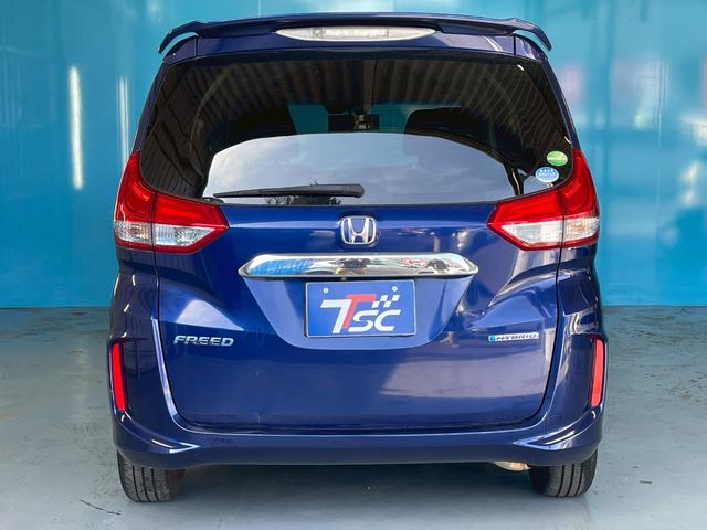 フリードハイブリッド ハイブリッド・ＥＸ　ＯＰ：１１インチ後席フリップダウンモニター／８インチ純正ナビ／ホンダセンシング／シートヒーター／レーダークルーズ／レーンキープアシスト／クリアランスソナー／ドライブレコーダー／ＬＥＤヘッド／ＥＴＣ／（51枚目）