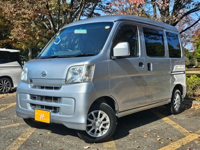 ハイゼットカーゴ クルーズターボ　ターボ　電格　切替４ＷＤ　ＥＴＣ　フルセグ　キーレス　前後ＰＷ　　Ｂｌｕｅｔｏｏｔｈ　ＳＤ再生　分割リアシートヘッドレスト有　社外アルミ　タバコ臭有（2枚目）