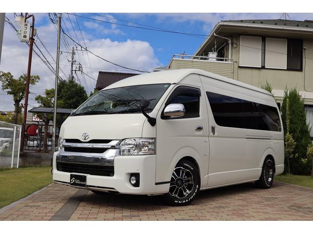 ハイエースコミューター スーパーロングGLターボ 10人乗り 3ナンバー乗用登録 普通免許可 ワンオーナー車 ツインモニター 黒レザー調シートカバー デジタルインナーミラー BARBERO16AW 玄武ローダウン VALENTIジュエルLEDテール(2枚目)