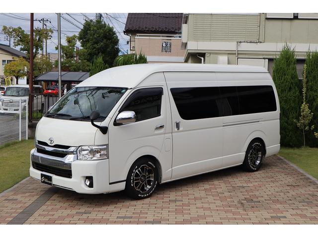 ハイエースコミューター スーパーロングGLターボ 10人乗り 3ナンバー乗用登録 普通免許可 ワンオーナー車 ツインモニター 黒レザー調シートカバー デジタルインナーミラー BARBERO16AW 玄武ローダウン VALENTIジュエルLEDテール(4枚目)