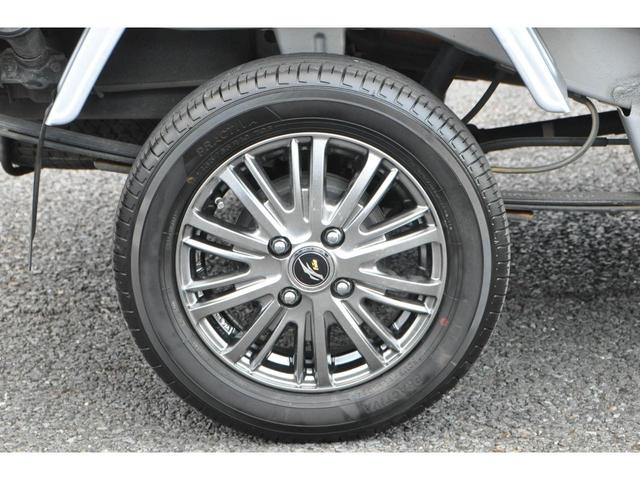 ハイゼットトラック ジャンボ 禁煙車 走28.820K メモリーナビ/1セグ/CD キーレス 社外13インチアルミ(2024年製ラジアルT) オートマ 3方開 ゲートプロテクター 鳥居 オーバーヘッドシェルフ(65枚目)