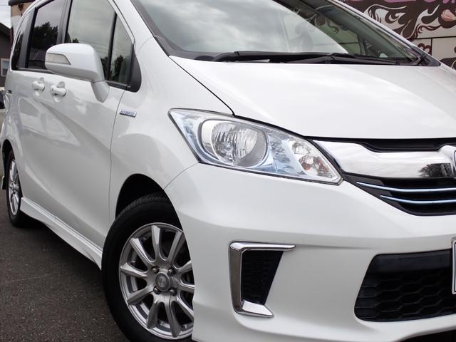 フリードハイブリッド ジャストセレクション 1年間走行無制限保証付き スマートキー ナビ TV Bluetooth CD DVD バックカメラ ETC 前後カメラドライブレコーダー 両側自動ドア クルーズコントロール HIDライト オートライト(10枚目)