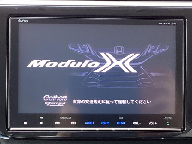 ステップワゴン モデューロＸ　禁煙／９型ナビ／６ＳＲＳ／パドル／ハーフレザー／スマートキー／Ｒカメ／ドアバイザー／１２セグ／両電扉／ＥＴＣ／ヒーデット＋オートリトラミラー／フォグ／オートライト／オートＡＣ／ＣＤ／１オーナー／ＭＲ（2枚目）