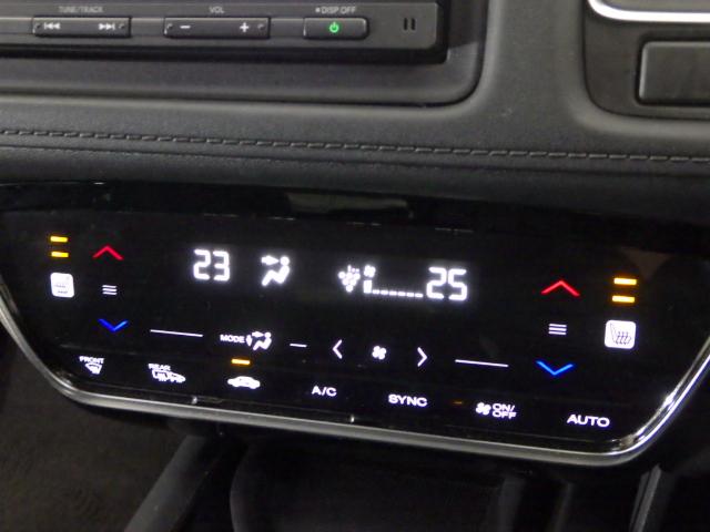 ヴェゼル ハイブリッドZ・ホンダセンシング 禁煙/ナビ/Rカメ/パドル■LEDフォグ■前後Dレコ/電暖席/ETC/スマキー/オートリトラ+ヒーデット+リバース連動ドアミラー/CD/TV/BTA/半革席/キーレス連動遠隔PW/熱線入ハーフシェイド(11枚目)