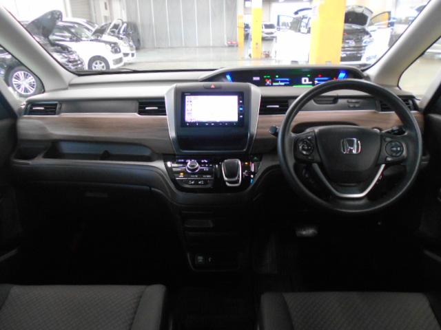 フリードハイブリッド ハイブリッド・Gホンダセンシング 禁煙■7人乗■ナビ/前後Dレコ/両電扉/電暖席/Rカメ/フルセグ/BTA/CD/ETC/LED/スマキー/ドアバイザ/間欠ワイパー/ロールサンシェード/オートリトラ+ヒーデットミラー/熱線入Fガラス(16枚目)