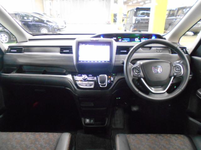 フリード+ハイブリッド ハイブリッド・クロスターホンダセンシング 6SRS/9型プレナビ/前後Dレコ■両側ハンズフリー電動扉■Fセンサー/半革席/12セグ/CD/BTA/電暖席/スマキー/ETC/LED/Rカメ/フォグ/禁煙/間欠ワイパ/熱線入ハーフシェイドFガ(17枚目)