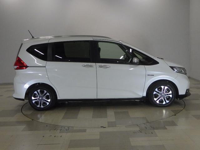 フリード+ハイブリッド ハイブリッド・クロスターホンダセンシング 6SRS/9型プレナビ/前後Dレコ■両側ハンズフリー電動扉■Fセンサー/半革席/12セグ/CD/BTA/電暖席/スマキー/ETC/LED/Rカメ/フォグ/禁煙/間欠ワイパ/熱線入ハーフシェイドFガ(29枚目)