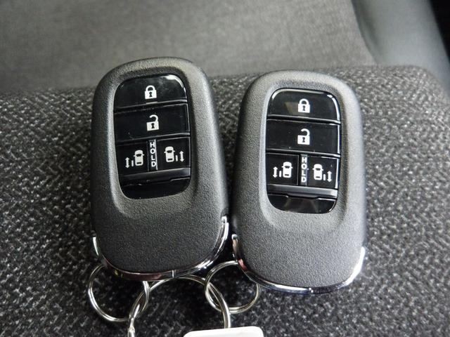 N-BOXカスタム ベースグレード 禁煙/デモカー/9型ナビ/前後Dレコ/両電扉/電暖席/Rカメ/フルセグ/LED/ETC/ロールサンシェード/BTA/CD/前後コーナーセンサー/6SRS/スマキー/オートリトラミラー/間欠ワイパー(20枚目)