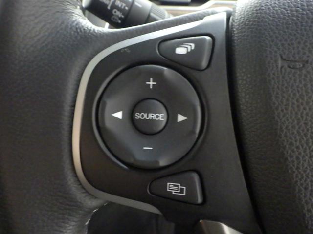 フリードハイブリッド ハイブリッド・クロスターホンダセンシング 1オナ・禁煙・純正Mナビ・前後ドラレコ・サイドSRS・運助シートヒーター・LED・ETC・USB・ブル-トゥース 両側Pスライドドア オートクルーズコントロール 記録簿 ワンオ-ナ- DVD再生可能(13枚目)