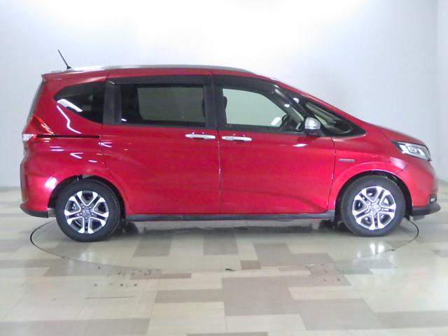 フリードハイブリッド ハイブリッド・クロスターホンダセンシング 1オナ・禁煙・純正Mナビ・前後ドラレコ・サイドSRS・運助シートヒーター・LED・ETC・USB・ブル-トゥース 両側Pスライドドア オートクルーズコントロール 記録簿 ワンオ-ナ- DVD再生可能(29枚目)