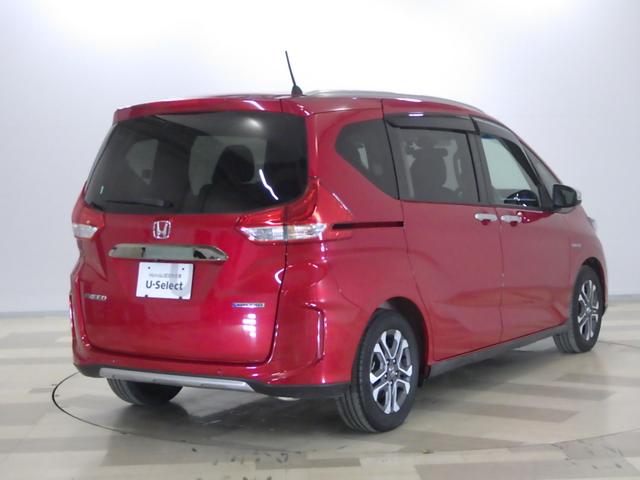 フリードハイブリッド ハイブリッド・クロスターホンダセンシング 1オナ・禁煙・純正Mナビ・前後ドラレコ・サイドSRS・運助シートヒーター・LED・ETC・USB・ブル-トゥース 両側Pスライドドア オートクルーズコントロール 記録簿 ワンオ-ナ- DVD再生可能(30枚目)