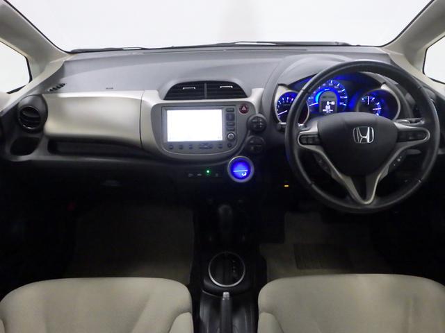 フィットハイブリッド ナビプレミアムセレクション 純正HDDナビ リアカメラ ETC HIDライト ヒートシーター スマートキー 記録簿 エアコン 運転席エアバッグ DVD再生 キーフリー ワンセグ パワーウィンドウ Bカメラ クルーズコントロール(9枚目)