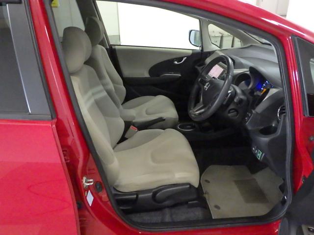 フィットハイブリッド ナビプレミアムセレクション 純正HDDナビ リアカメラ ETC HIDライト ヒートシーター スマートキー 記録簿 エアコン 運転席エアバッグ DVD再生 キーフリー ワンセグ パワーウィンドウ Bカメラ クルーズコントロール(11枚目)