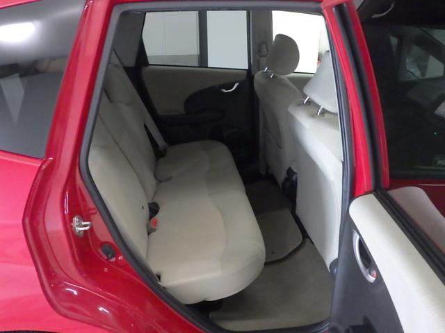 フィットハイブリッド ナビプレミアムセレクション 純正HDDナビ リアカメラ ETC HIDライト ヒートシーター スマートキー 記録簿 エアコン 運転席エアバッグ DVD再生 キーフリー ワンセグ パワーウィンドウ Bカメラ クルーズコントロール(12枚目)