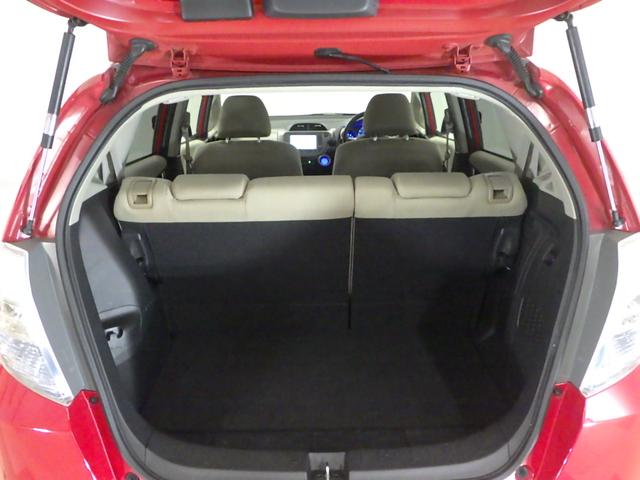 フィットハイブリッド ナビプレミアムセレクション 純正HDDナビ リアカメラ ETC HIDライト ヒートシーター スマートキー 記録簿 エアコン 運転席エアバッグ DVD再生 キーフリー ワンセグ パワーウィンドウ Bカメラ クルーズコントロール(14枚目)