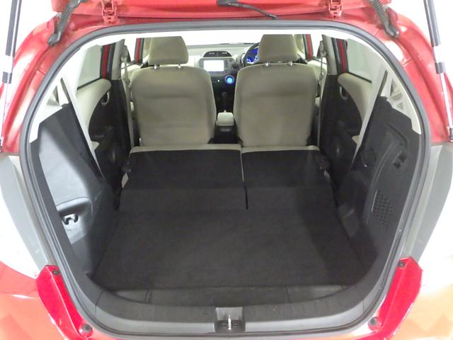 フィットハイブリッド ナビプレミアムセレクション 純正HDDナビ リアカメラ ETC HIDライト ヒートシーター スマートキー 記録簿 エアコン 運転席エアバッグ DVD再生 キーフリー ワンセグ パワーウィンドウ Bカメラ クルーズコントロール(16枚目)