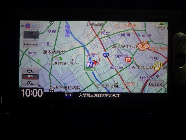 フィット 13G・Fパッケージ 1オナ・禁煙・純正Mナビ・14AW・ETC・CD・DVD・1セグ・ブル-トゥース イモビ ワンオーナー車 DVD再生可能 スマ-トキ- 記録簿有り VSA ETC付き 助手席エアバッグ Rカメラ PS(3枚目)