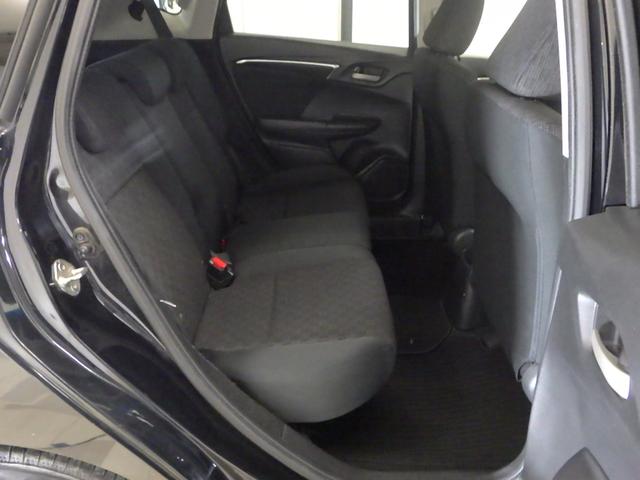フィット 13G・Fパッケージ 1オナ・禁煙・純正Mナビ・14AW・ETC・CD・DVD・1セグ・ブル-トゥース イモビ ワンオーナー車 DVD再生可能 スマ-トキ- 記録簿有り VSA ETC付き 助手席エアバッグ Rカメラ PS(9枚目)