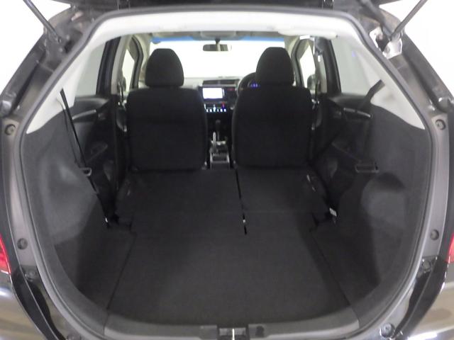 フィット 13G・Fパッケージ 1オナ・禁煙・純正Mナビ・14AW・ETC・CD・DVD・1セグ・ブル-トゥース イモビ ワンオーナー車 DVD再生可能 スマ-トキ- 記録簿有り VSA ETC付き 助手席エアバッグ Rカメラ PS(12枚目)