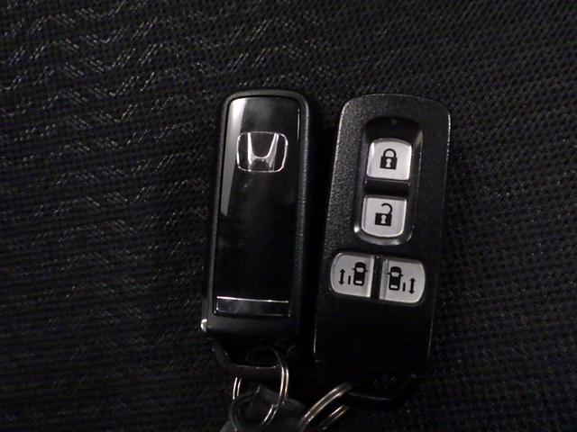 N-BOX+カスタム G・Lパッケージ 禁煙・ワンオーナー・両側電動・ナビ・リアカメラ 禁煙車 USB ETC車載器 エアコン Rカメラ キーレス ABS 運転席助手席エアバック ESC DVD再生 1セグTV 両側パワースライドドア(13枚目)