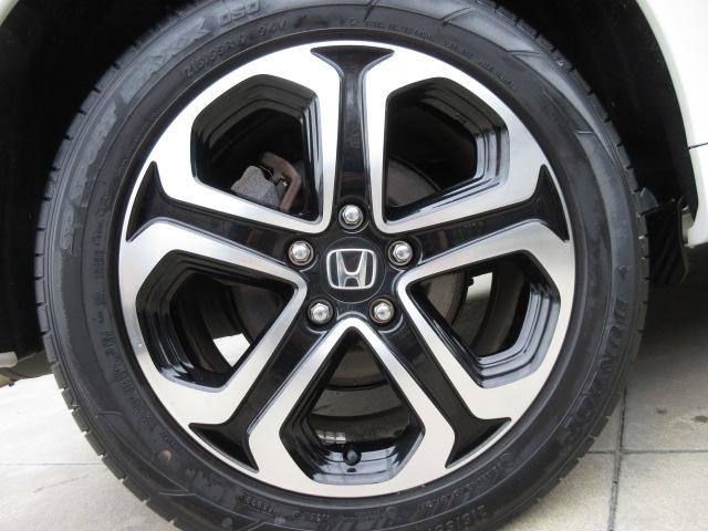 ヴェゼル ハイブリッドZ・ホンダセンシング 1オナ・禁煙・純正Mナビ・本革シート・運助パワーシート・運助シートヒーター・サイドSRS・LED・ETC・USB・ブル-トゥース レーダーサポート パワ-シ-ト 1オーナ- DVD再生機能 整備記録簿(8枚目)