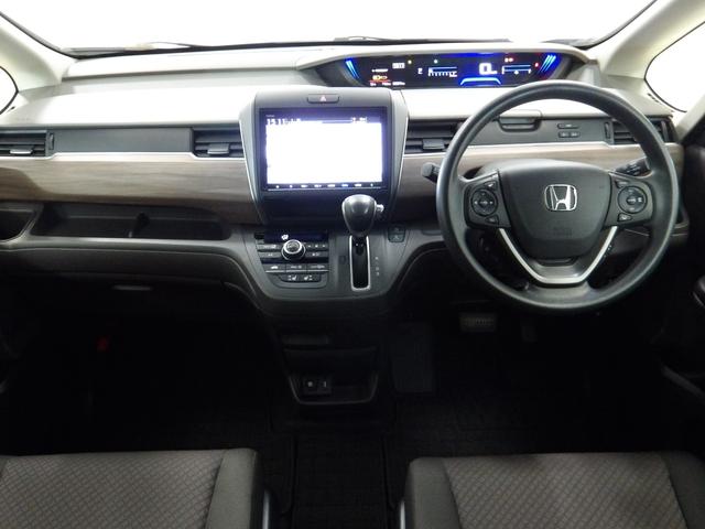 フリード Ｇ・ホンダセンシング　６人乗り　シートヒーター　ＥＴＣ　ＬＥＤ　Ｆセグ　追突被害軽減ブレーキ　ｉストップ　Ｗエアバッグ　パワーウィンドウ　１オ－ナ－　アクティブクルーズコントロール　スマートキ　カーテンエアバッグ　禁煙（14枚目）