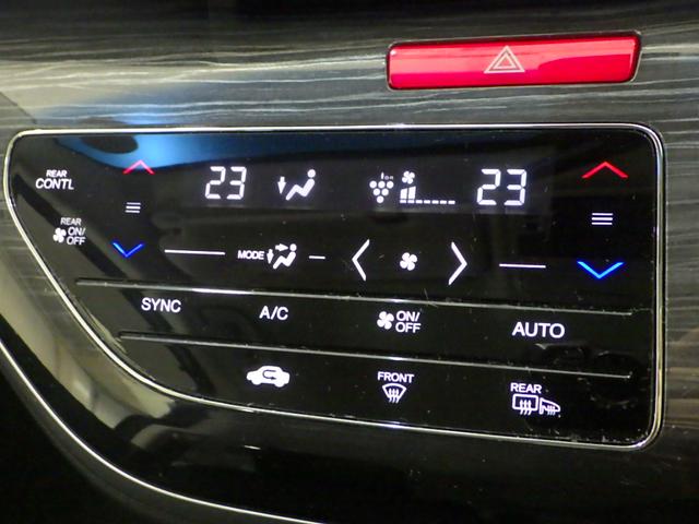 オデッセイハイブリッド ハイブリッドアブソルート・ホンダセンシングEXパック 8型プレミアムインターN スポーツP オートリトラM リモコンコーナーP AC電源1500W 全席オートパワーW ブラインドスポットI 3ゾーンコントロールAC 2列目大型ロールS 大型A 禁煙車(12枚目)