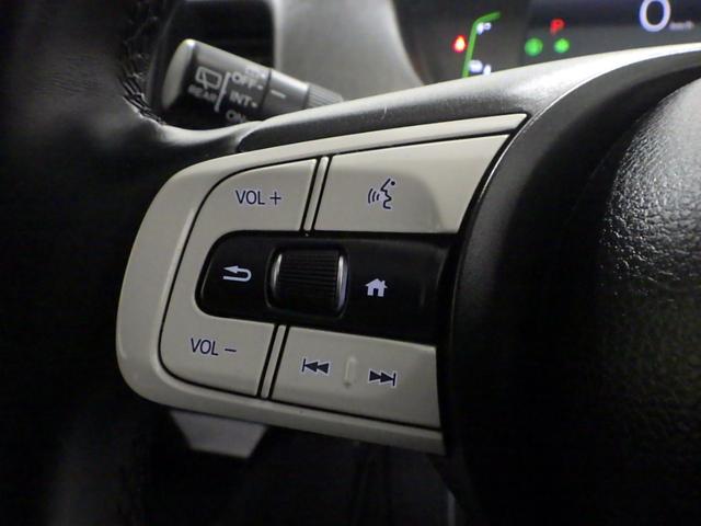 フィット e:HEVホーム 禁煙車 SD録音 BTA フルセグ USB 前後誤発進抑制機能 クリソナ 助手席エアバッグ 運転席エアバッグ 1オナ アイドリングストップ LEDライト バックカメラ ABS サイドエアバッグ VSA(10枚目)