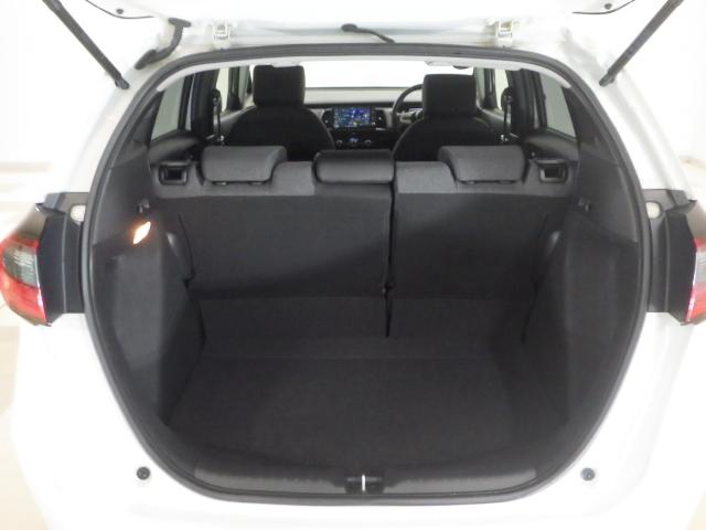 フィット ホーム 禁煙車 元当社デモカー 純正ナビ BTA リアカメラ ETC LED パーキングセンサー 記録簿 衝突軽減 ソナー USB接続 AAC 横滑り防止機能 サイドエアバック ワンオーナー車 スマキー(21枚目)