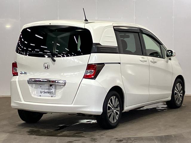 フリードスパイク GL 禁煙 ストラーダナビ 両側電動スライドドア スマートキー リアカメラ ETC クルーズコントロール 横滑り防止装置 弊社下取り車 純正アルミ 地デジ CD/DVD フルオートエアコン 記録簿付き(7枚目)