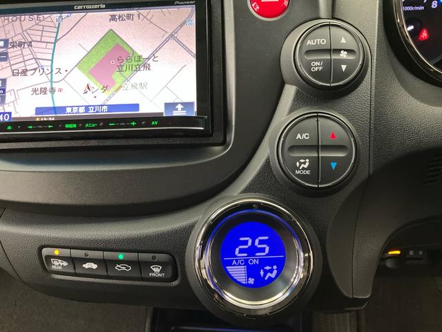 フィットハイブリッド RS 禁煙 カロッツェリアメモリー リアカメラ 弊社下取車 記録簿付 クルーズコントロール 横滑り防止装置 地デジ CD HIDヘッドライト ETC パドルシフト キーレスエントリーキー 3スポーツモード(18枚目)