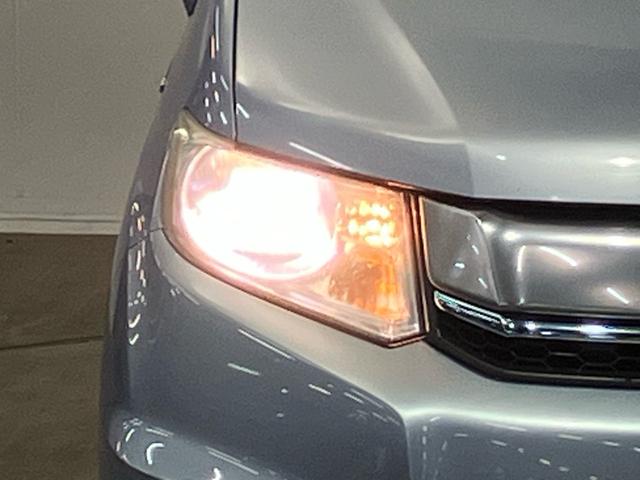 フリードスパイクハイブリッド ジャストセレクション　禁煙　純正ナビ　弊社下取りワンオーナー車　後期モデル　両側電動スライドドア　リアカメラ　スマートキー　クルーズコントロール　Ｂｌｕｅｔｏｏｔｈ　地デジ　ＣＤ／ＤＶＤ　横滑り防止装置　ＨＩＤ　ＥＴＣ（18枚目）