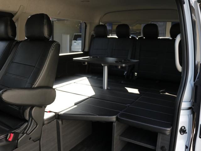 ハイエースワゴン GL ロング リラクシングシートアレンジ施工オリジナルフロントスポイラーオーバーフェンダーオリジナルLEDテールオリジナル17インチアルミ1.5インチローダウンパイオニアSDナビパイオニアフリップダウンモニター装備(24枚目)