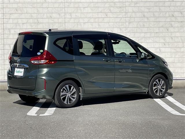 フリードハイブリッド ハイブリッド・Gホンダセンシング 社外8型SDナビ(フルセグTV/CD/DVD/BT) ホンダセンシング フリップダウンモニター 両側パワスラ クルコン ドラレコ ETC シートヒーター USB 純正LED 純正アルミホイール(35枚目)