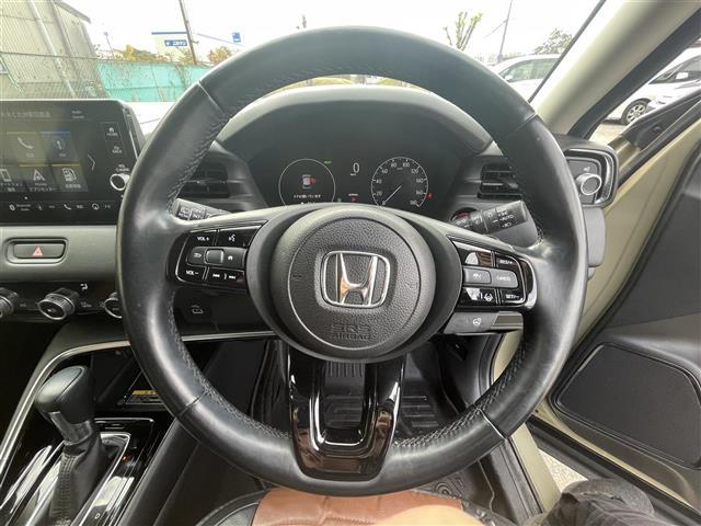 ヴェゼル ｅ：ＨＥＶ　Ｚ　純正９型ディスプレイオーディオ【ナビ・ＢＴ・フルセグＴＶ】　バックカメラ　ホンダセンシング　コーナーセンサー　ＭＴモード付ＡＴ　ブラインドスポット　レーダークルコン　社外ドライブレコーダー前後　シート（6枚目）