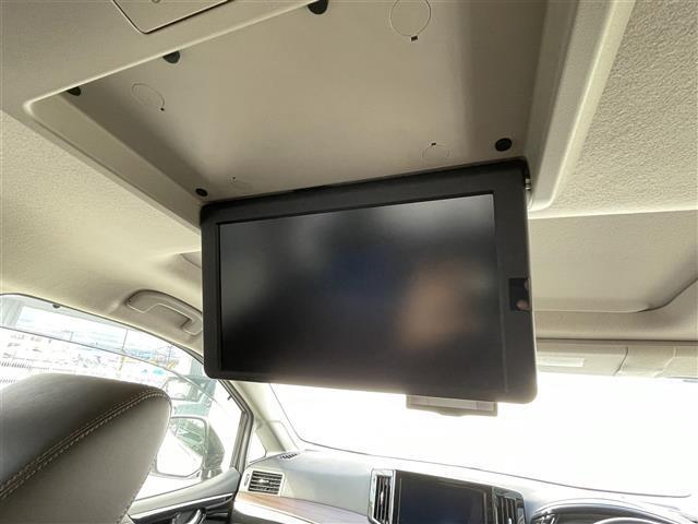 エルグランド ３５０ハイウェイスターアーバンクロム　純正１０型ＳＤナビ（フルセグＴＶ／ＣＤ／ＤＶＤ／ＢＴ）　全方位　コーナーセンサー　ブラインドスポット　Ｗサンルーフ　フリップダウンモニター　クルコン　助手席オットマン　ドラレコ　電動リア　ＥＴＣ（7枚目）