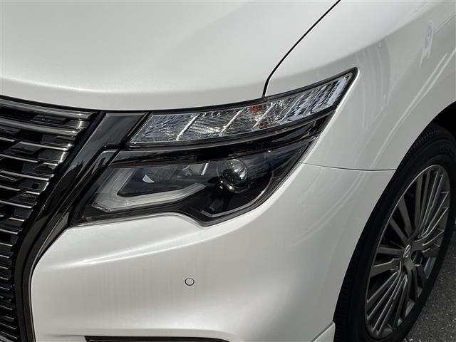 エルグランド ３５０ハイウェイスターアーバンクロム　純正１０型ＳＤナビ（フルセグＴＶ／ＣＤ／ＤＶＤ／ＢＴ）　全方位　コーナーセンサー　ブラインドスポット　Ｗサンルーフ　フリップダウンモニター　クルコン　助手席オットマン　ドラレコ　電動リア　ＥＴＣ（36枚目）