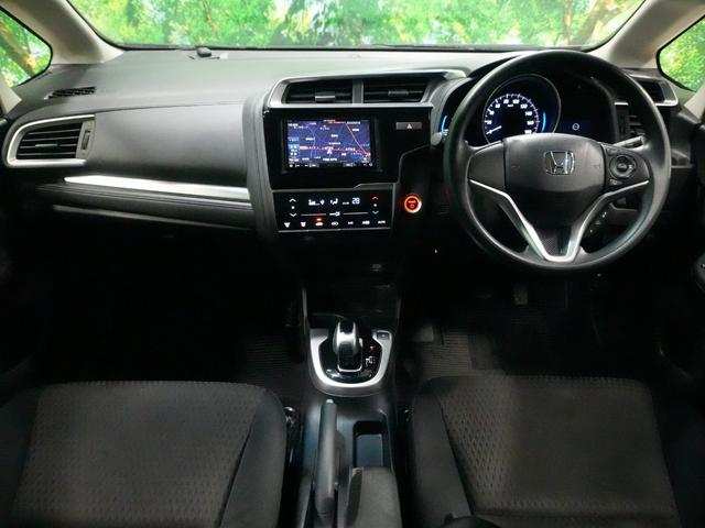 フィットハイブリッド F 衝突軽減ブレーキ レーダークルーズ レーンキープアシスト 社外メモリナビ スマートキー DVDビデオ再生 プッシュスタート ETC ドライブレコーダー ウインカーミラー WSRS ABS(6枚目)