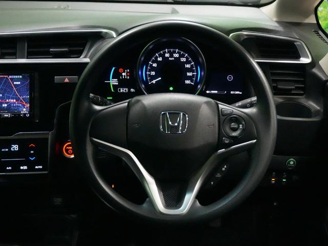 フィットハイブリッド F 衝突軽減ブレーキ レーダークルーズ レーンキープアシスト 社外メモリナビ スマートキー DVDビデオ再生 プッシュスタート ETC ドライブレコーダー ウインカーミラー WSRS ABS(8枚目)