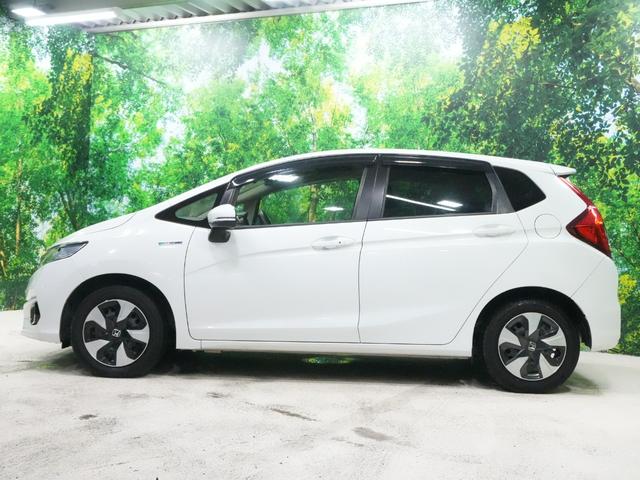 フィットハイブリッド F 衝突軽減ブレーキ レーダークルーズ レーンキープアシスト 社外メモリナビ スマートキー DVDビデオ再生 プッシュスタート ETC ドライブレコーダー ウインカーミラー WSRS ABS(26枚目)